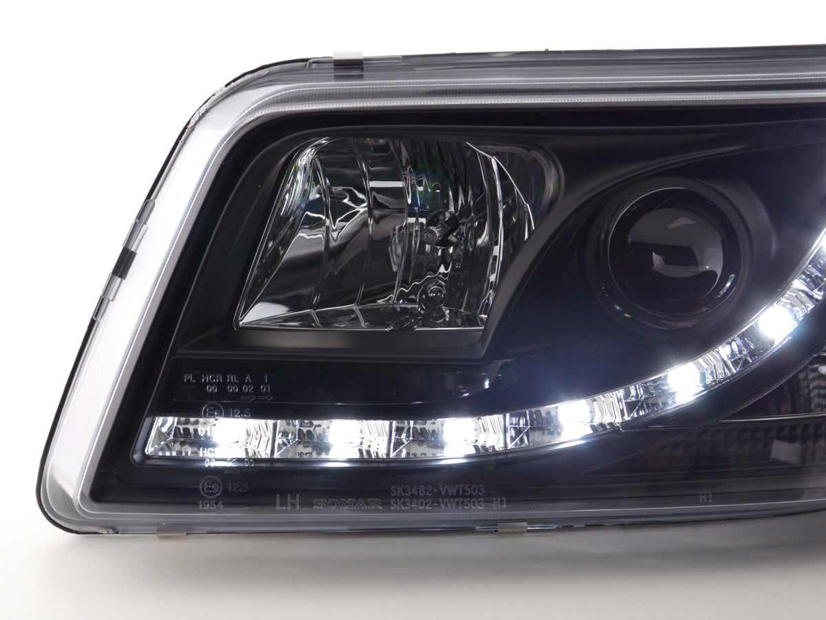 Scheinwerfer Set Daylight LED TFL-Optik VW Bus Typ T5 03-09 schwarz Scheinwerfer Set Daylight LED TFL-Optik VW Bus Typ T5 03-09 schwarz